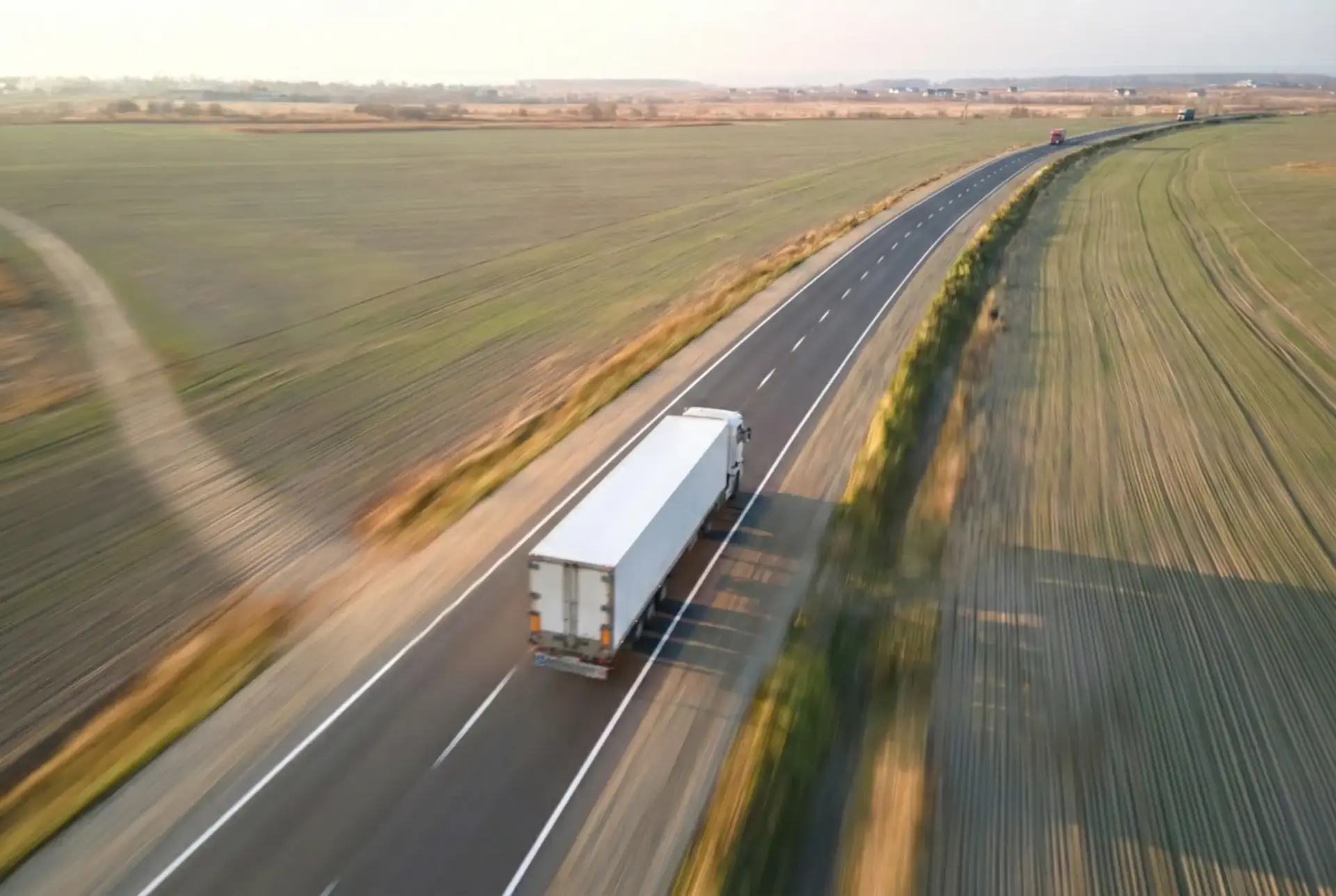 Aerial view of a semi truck with PolyFrost coated trailer.