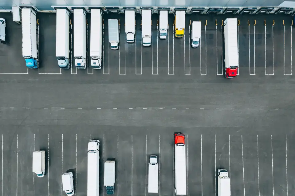 Aerial view of many trucks at the loading docks.