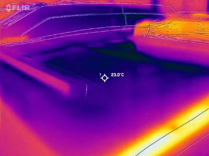 This thermal shows cooler results when a passenger bus cabin is coated with PolyFrost.